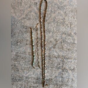 Assortment of phone wristlets and crossbody strap